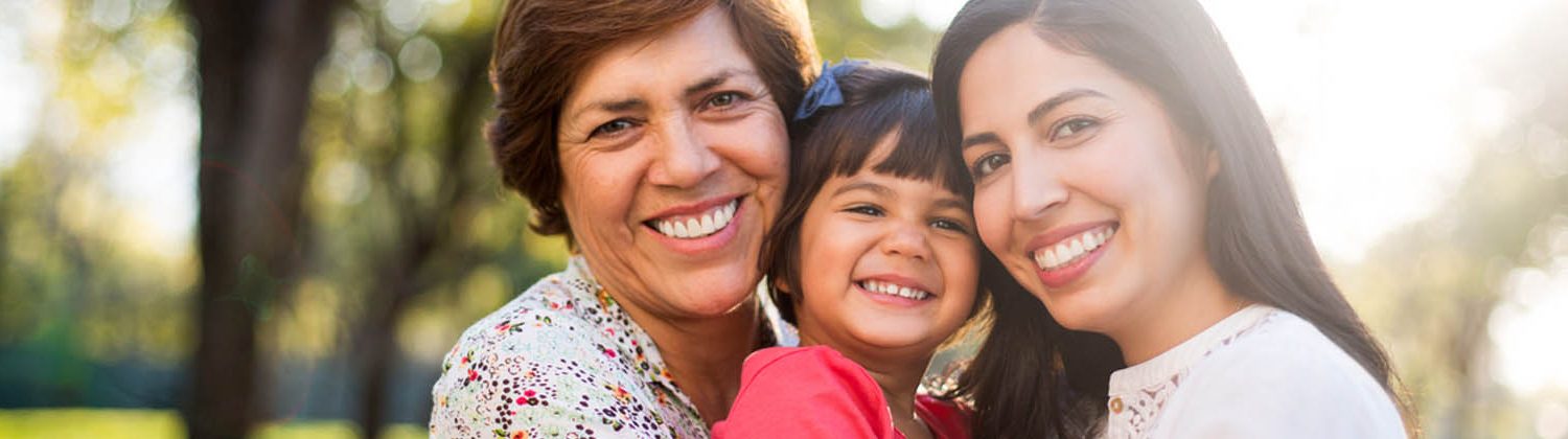 Two women and girl smiling