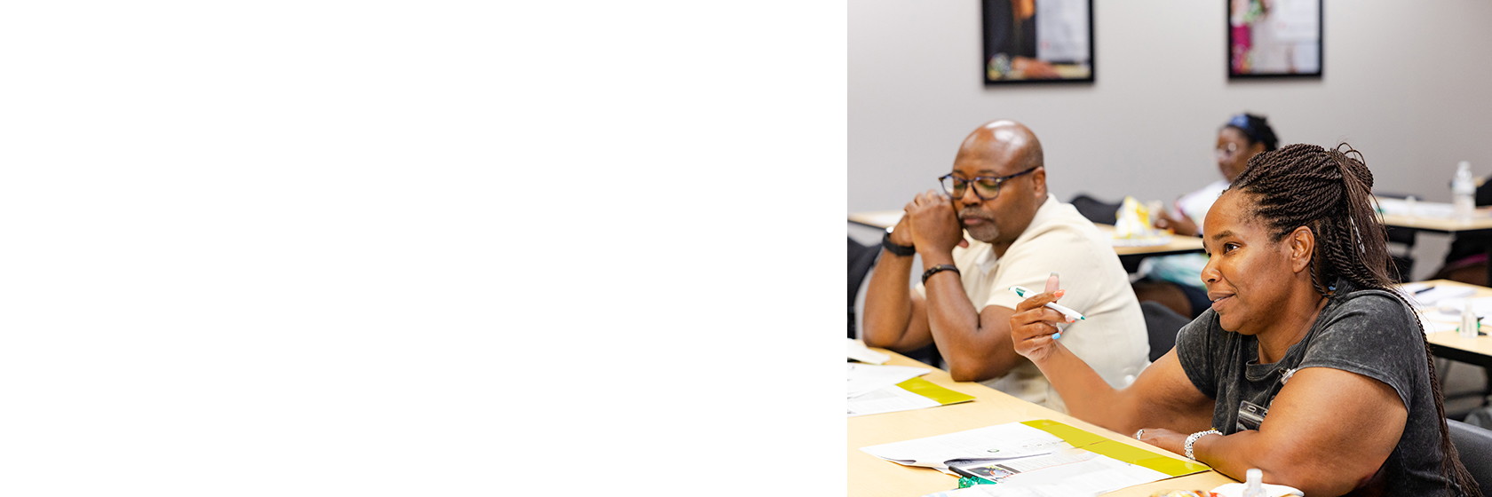 Image of adults in class talking about home ownership