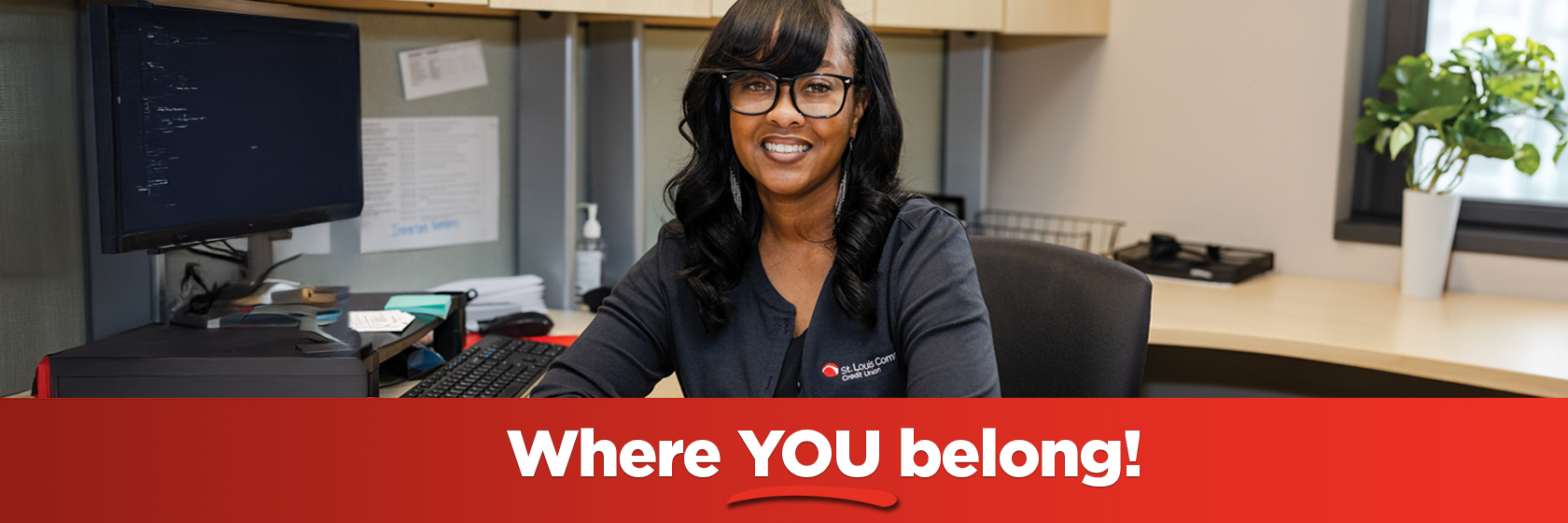 Image of a woman in glasses smiling above a banner that says "Where YOU belong"