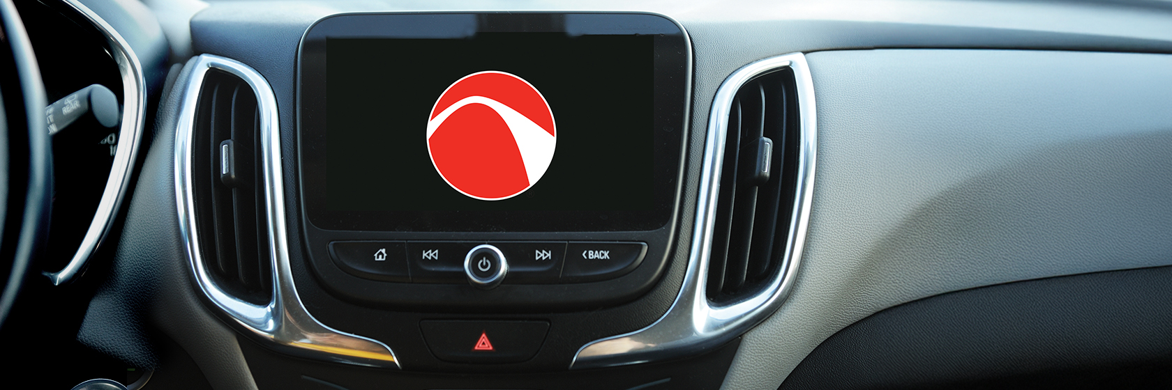 Image of a vehicles dashboard screen with the SLCCU logoball on it.