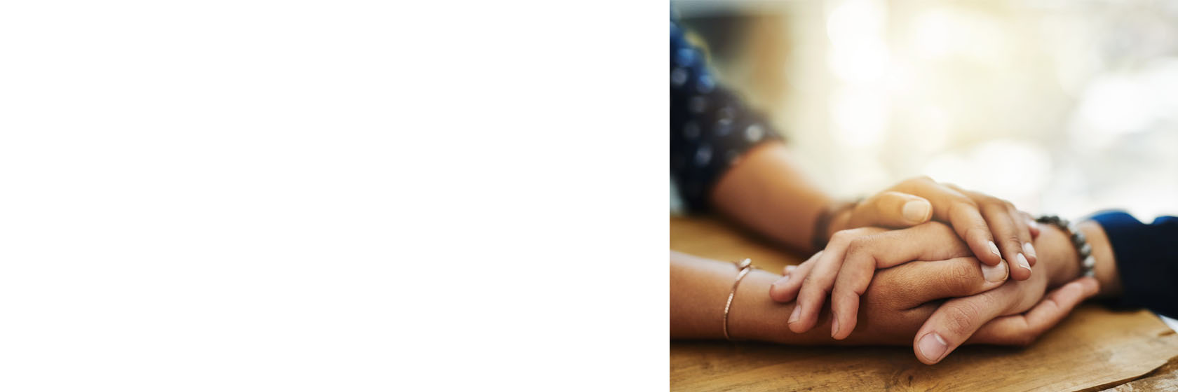 person holding someone's hand gently